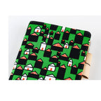 Green Hobonichi Techo A5 cover with stylized houses and red polka dot roof accents