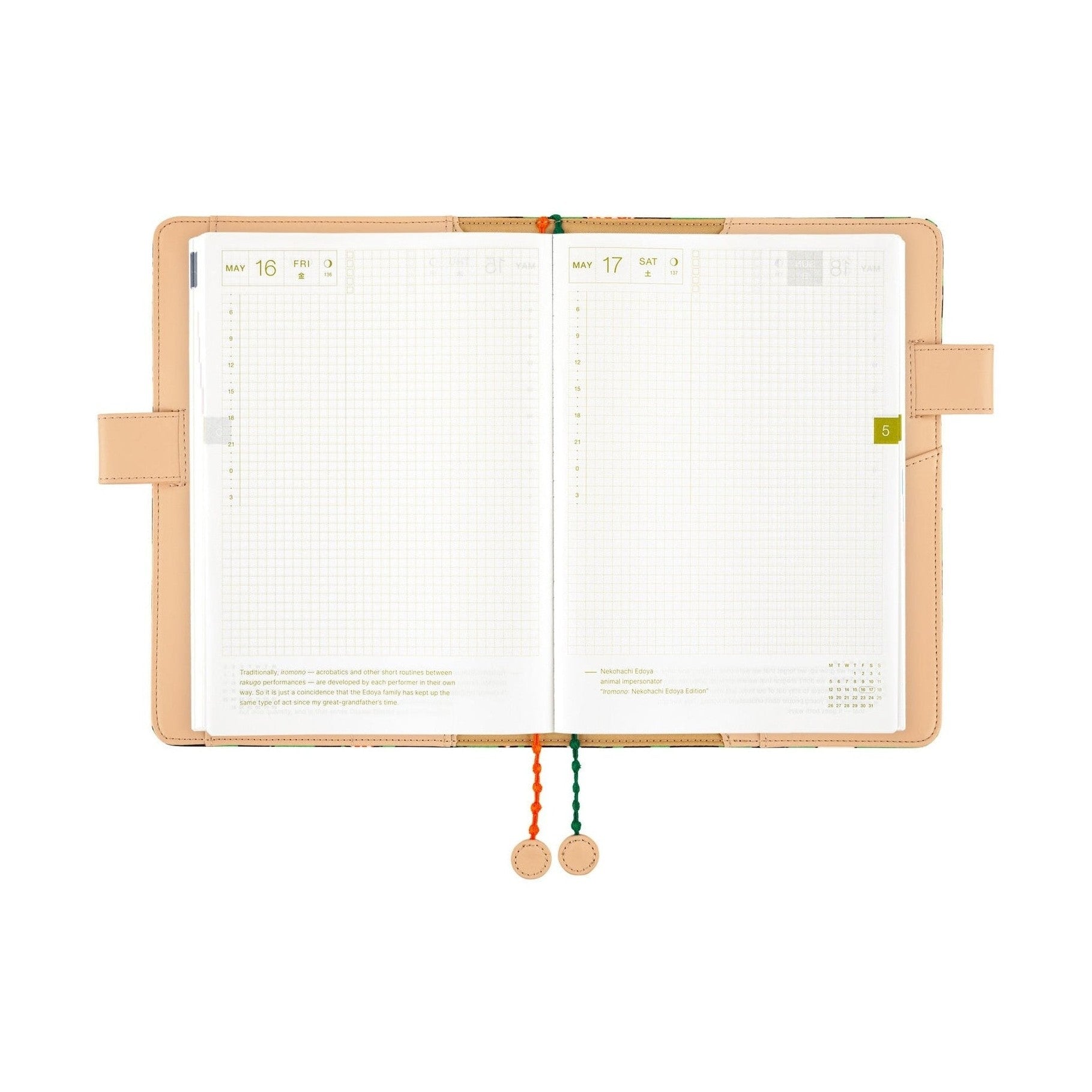 Open Hobonichi Techo A5 planner displaying May dates and beaded string closure