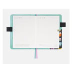 Hobonichi Techo A5 daily planner spread with June dates inside Yumi Kitagishi illustrated cover