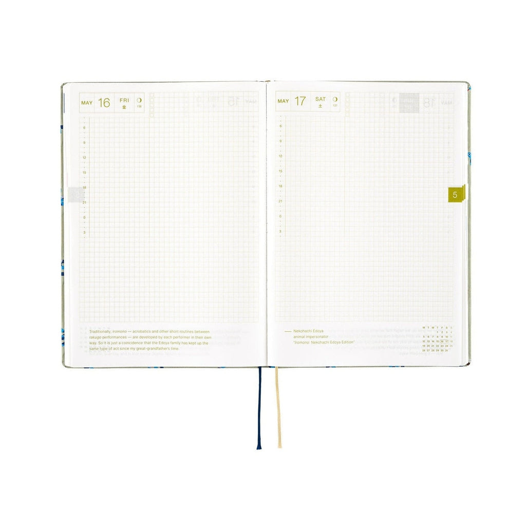 Open Hobonichi Techo A5 2025 diary displaying May 16-17 grid pages with green day markers and bookmark cords