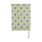 Front view of Hobonichi Techo A5 2025 Snake Toy diary cover featuring olive-green fabric and pipe-smoking snake design