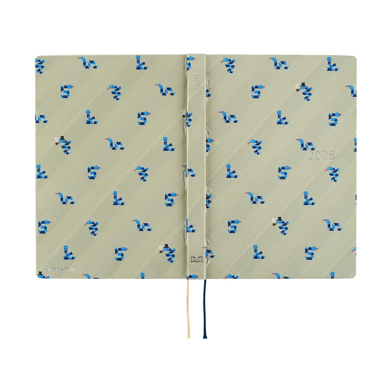 Hobonichi Techo A5 2025 Snake Toy diary open showing beige woven cover with blue snake pattern and pipe-wearing snake detail