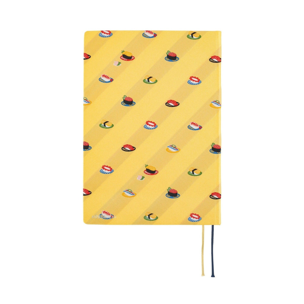 Yellow Hobonichi Techo A5 diary front cover showing diagonal sushi plate pattern
