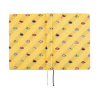 Open Hobonichi Techo A5 2025 diary with yellow sushi pattern cover and ribbon bookmark