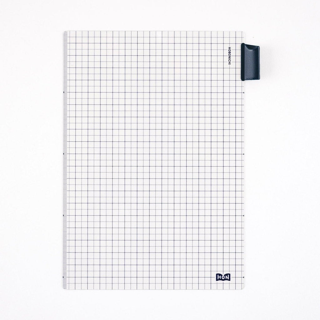 Hobonichi Techo A5 cream cover with blue grid pattern and attached pencil holder
