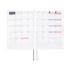 Hobonichi Techo A5 April 2025 monthly calendar with pink weekend highlights