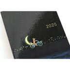 Hobonichi Techo A6 2025 hardcover with matte black finish and gold foil fox illustration