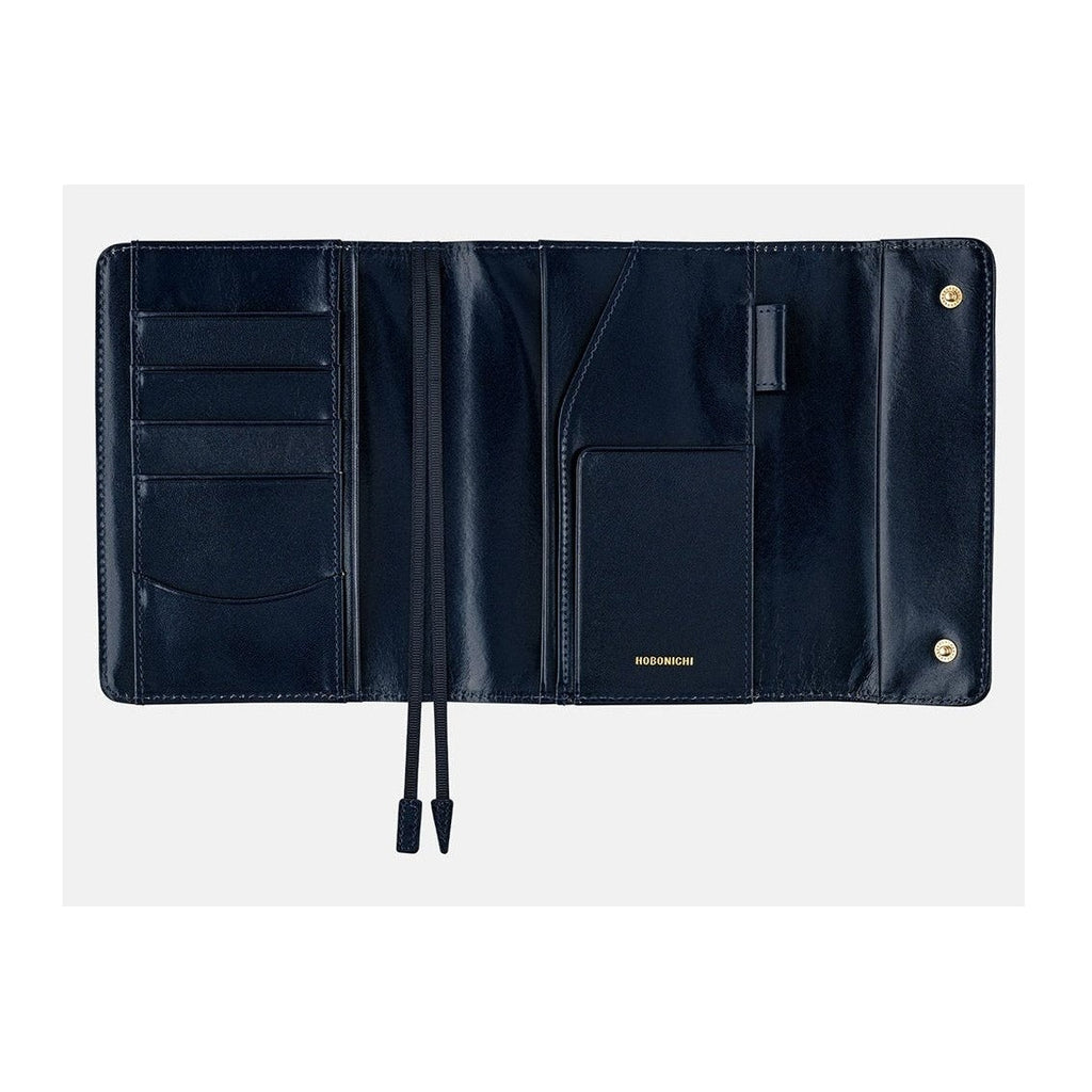 Interior view of navy Hobonichi cover with card slots, elastic band, and embossed logo