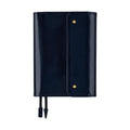 Deep navy Hobonichi Techo A6 leather cover with gold buttons and pen loop