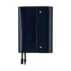 Deep navy Hobonichi Techo A6 leather cover with gold buttons and pen loop