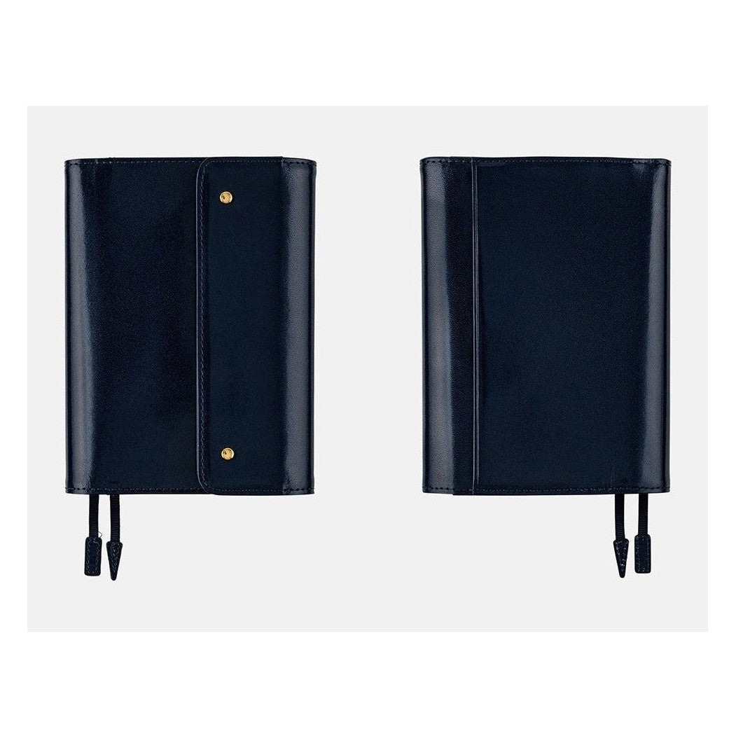 Front and back views of closed deep navy tri-fold A6 leather cover with elastic straps