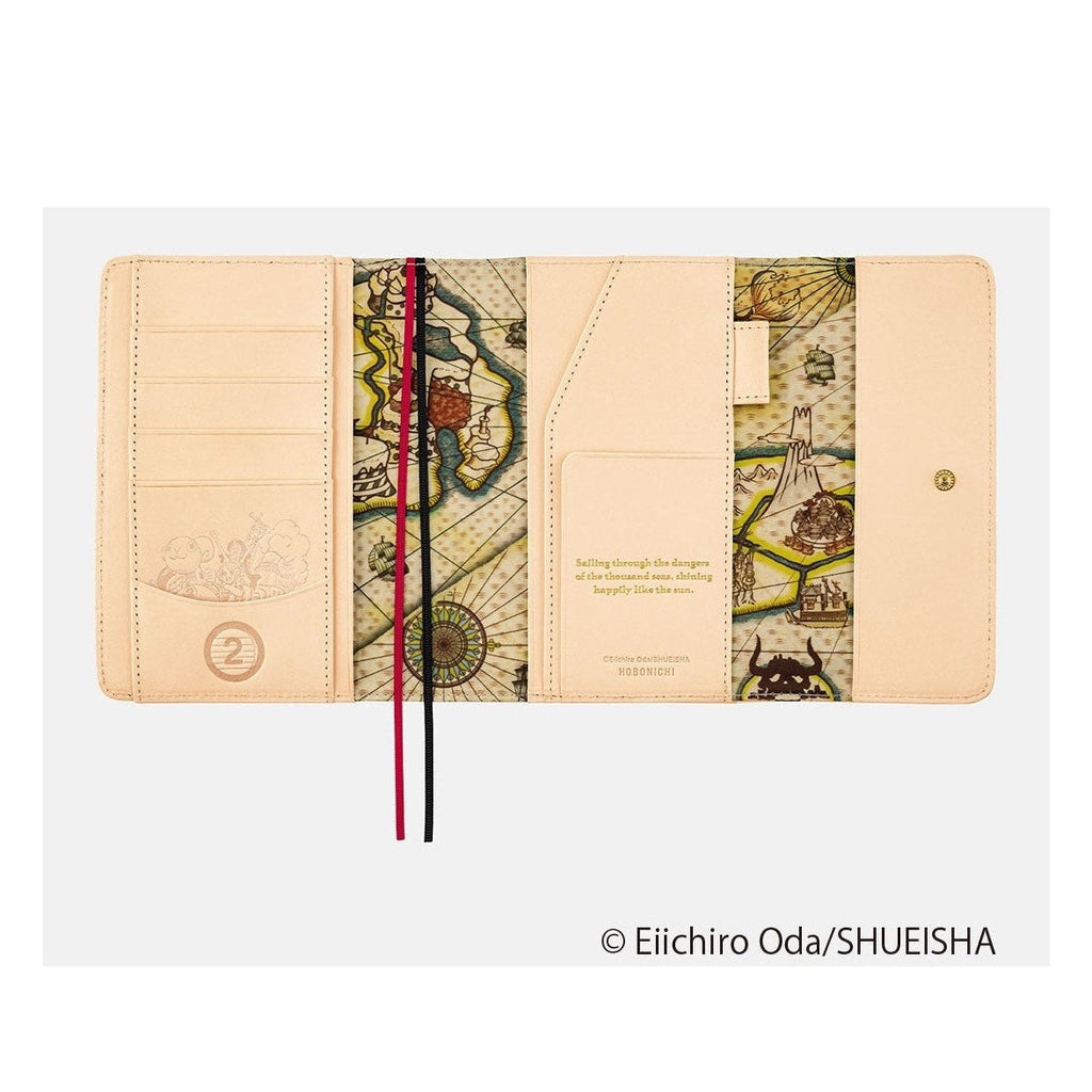 Interior pockets and nautical map spread on open Hobonichi Techo A6 One Piece magazine cover