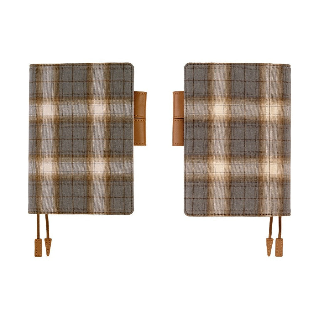 Pair of Hobonichi A6 original planner covers featuring grey and brown plaid cotton texture