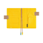 Interior view of Hobonichi A6 cover with yellow pockets and Hobonichi label