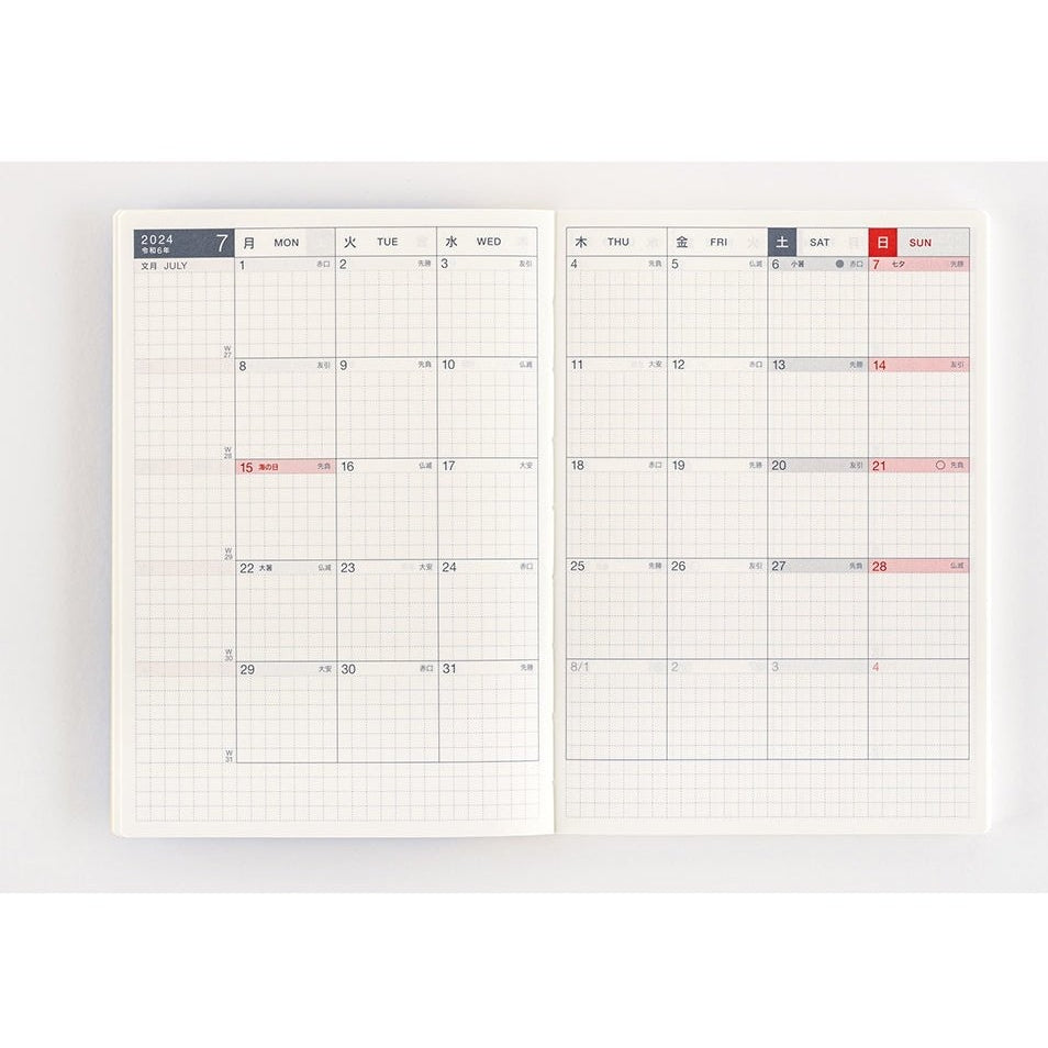 July 2024 grid calendar spread in Hobonichi Techo Day-Free A6 with Japanese day labels