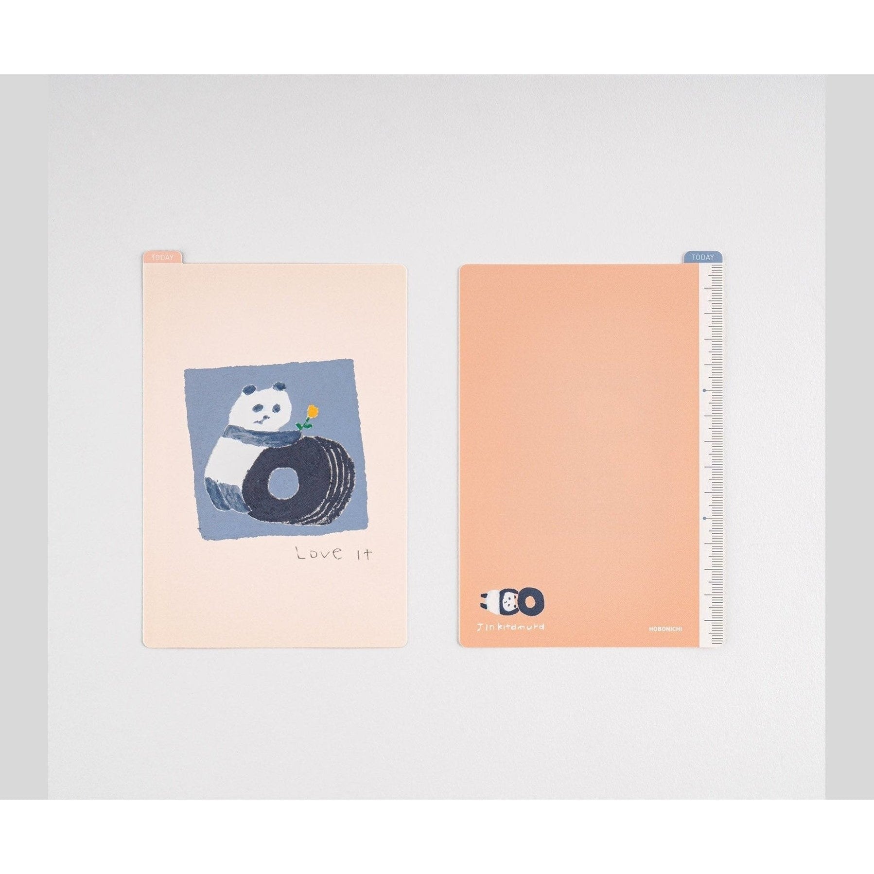Hobonichi A6 pencil board with pink beige cover and panda holding yellow flower