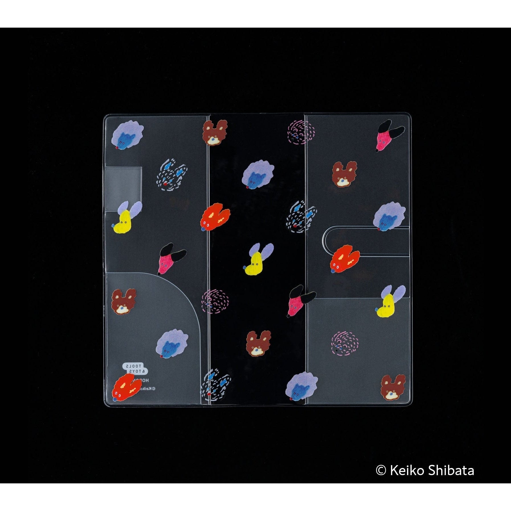 Clear PVC Hobonichi Techo cover with Keiko Shibata dog art on black background