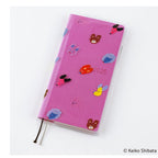 Hobonichi Techo Weeks clear cover featuring seven playful dogs and 2025 date