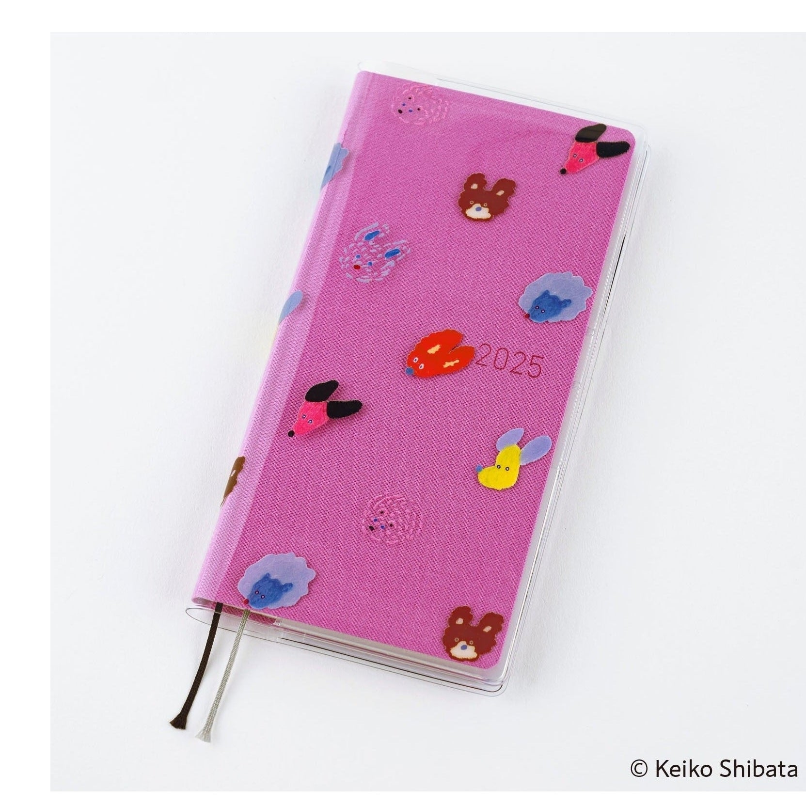 Hobonichi Techo Weeks clear cover featuring seven playful dogs and 2025 date