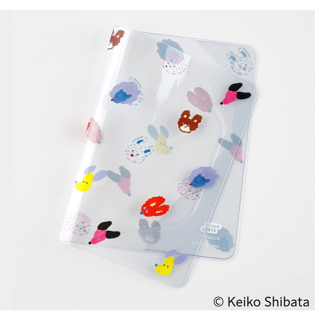 Transparent protective PVC sleeve for A6 Hobonichi Techo with whimsical dog design