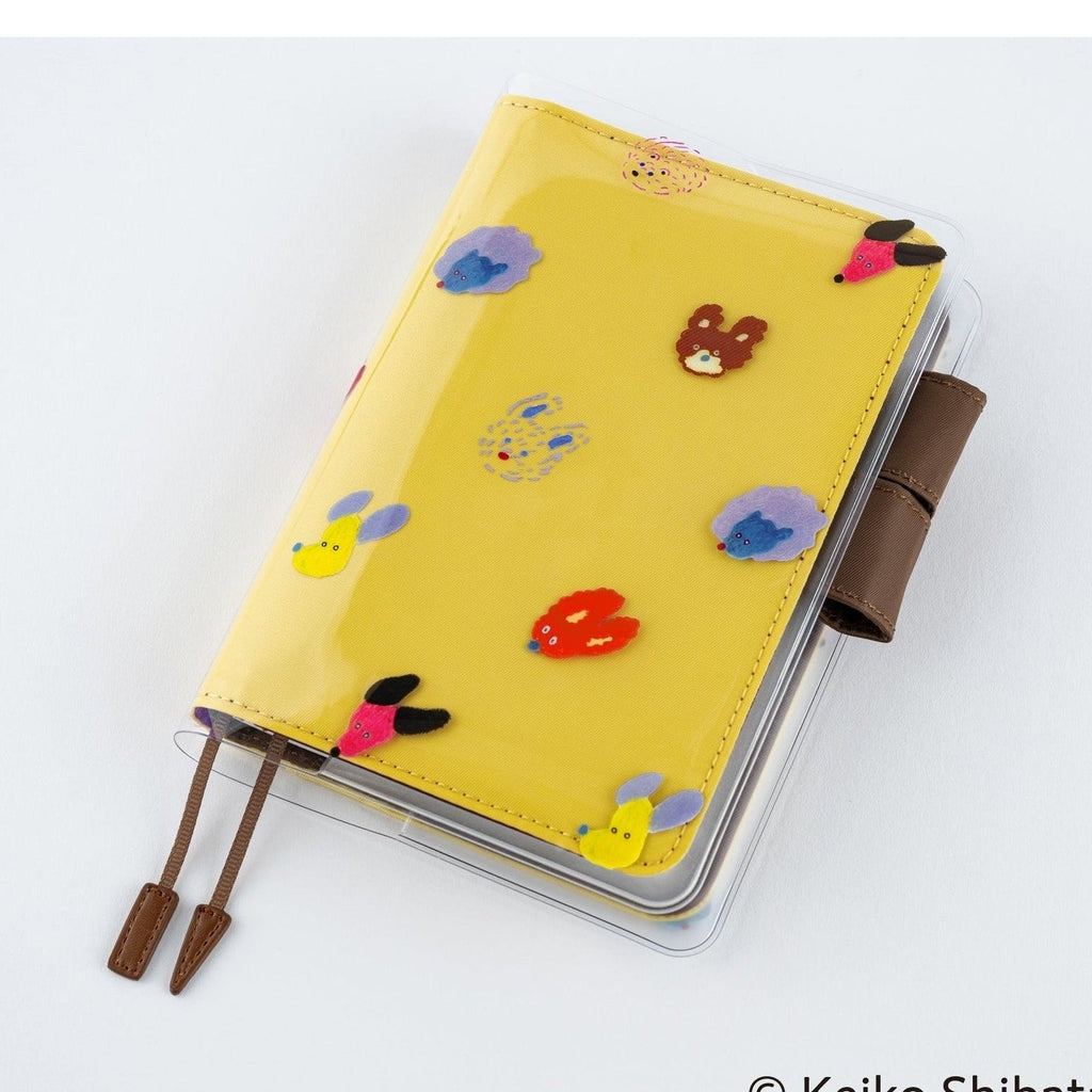 A6 Hobonichi Techo notebook inside clear PVC cover with dog ears artwork