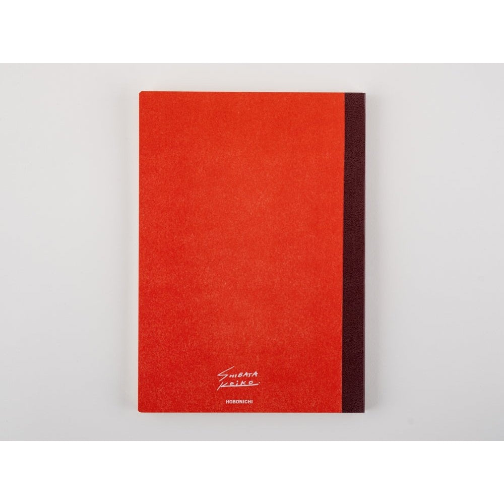 Back cover of Hobonichi Techo notebook with orange textured paper