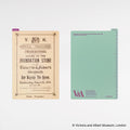 Hobonichi V&A collaboration pencil board showing beige historical text front and mint green back with ruler edge