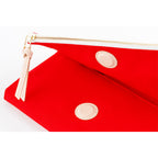 Close-up of red cover interior with dual circular leather patches