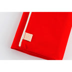 Red Hobonichi Techo Weeks cover with white zipper and beige leather pull