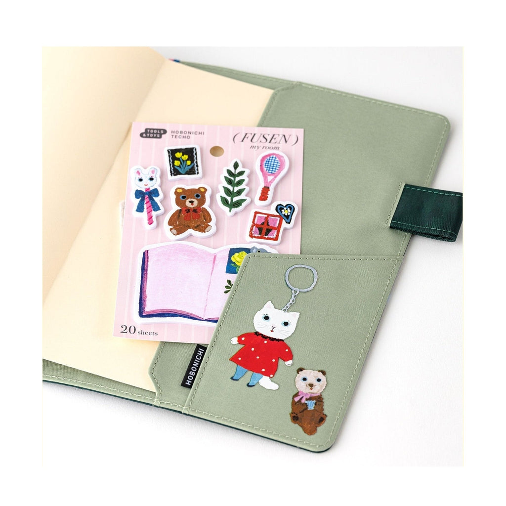 Green Hobonichi Techo cover with My Room sticker sheet and character stickers