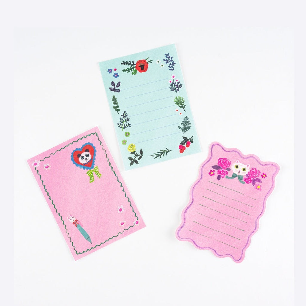 Yumi Kitagishi White Cat stationery notepad set featuring panda, floral borders, and scalloped edges for journaling