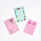 Yumi Kitagishi White Cat stationery notepad set featuring panda, floral borders, and scalloped edges for journaling