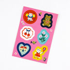 Die-cut sticker sheet from Yumi Kitagishi White Cat collection showing cats, bears, and cherries on matte paper