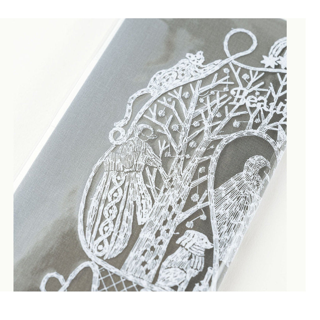 Close-up of Iyo Okumi winter illustration details on Hobonichi Techo Weeks clear cover