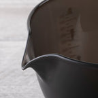 Kai Nyammy Cat Measuring Bowl 1L dark gray matte spout detail on wood surface