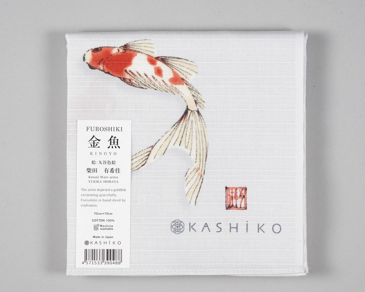Folded Kashiko goldfish furoshiki with paper label showing details