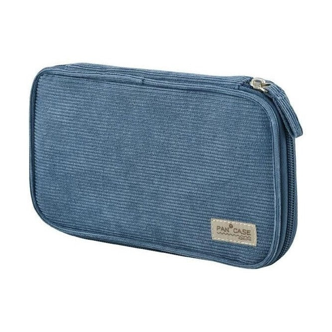 Beige corduroy Kokuyo Pancase open with stationery organized in dual compartments alongside yellow blue and gray cases