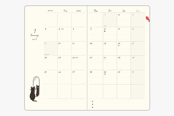 Midori diary open two-page monthly calendar grid for January 2027 with red highlighted dates