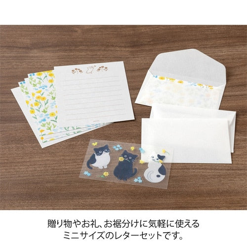 Midori Douzo Mini Letter Set contents on wood including cat stationery