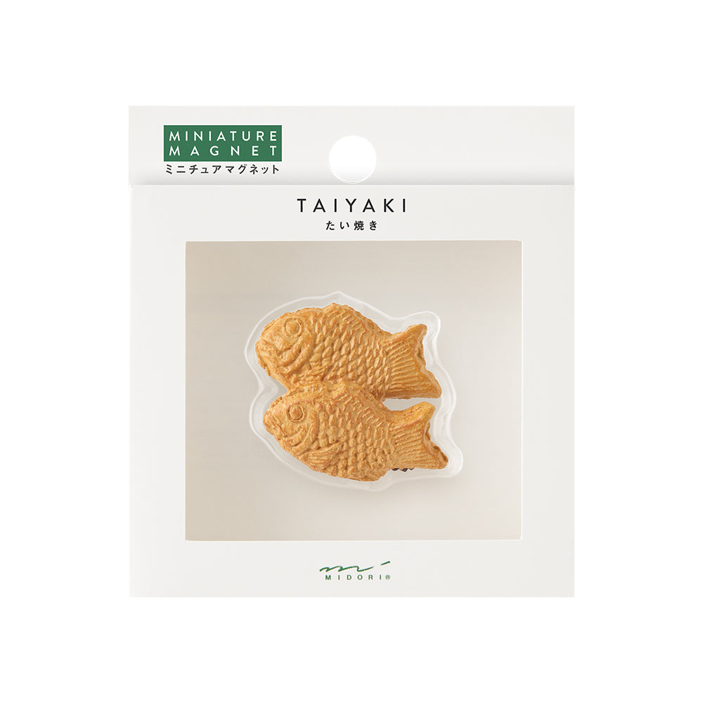 Packaged hyper-realistic taiyaki miniature magnet with golden-brown fish design