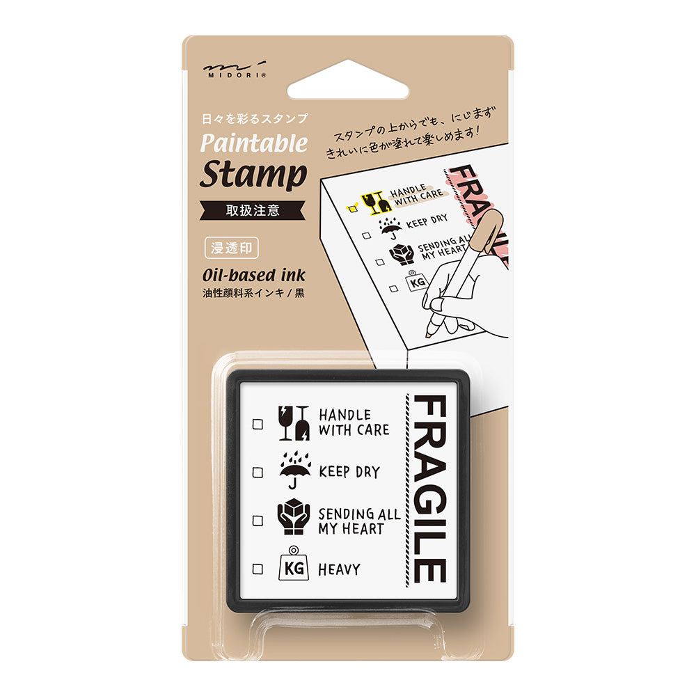 Midori self-inking shipping label with fragile icons
