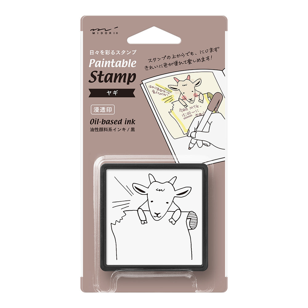 Midori self-inking stamp with oil-based ink, goat design on brown backing card