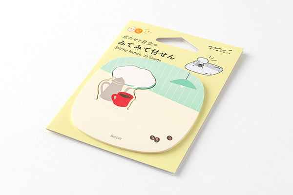 Flat lay of Midori sticky notes packaging with folding instruction diagram