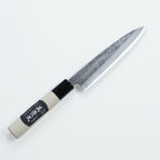 Mikihisa knife showing tsuchime blade texture and labeled wooden handle
