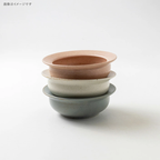 Set of three stacked Minoru Cou bowls in terracotta, off-white, and Shadow Blue