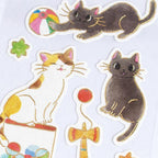 NB Nekorobi Retro Seal sticker detail showing gold foil accents on die-cut cat and dagashi illustrations
