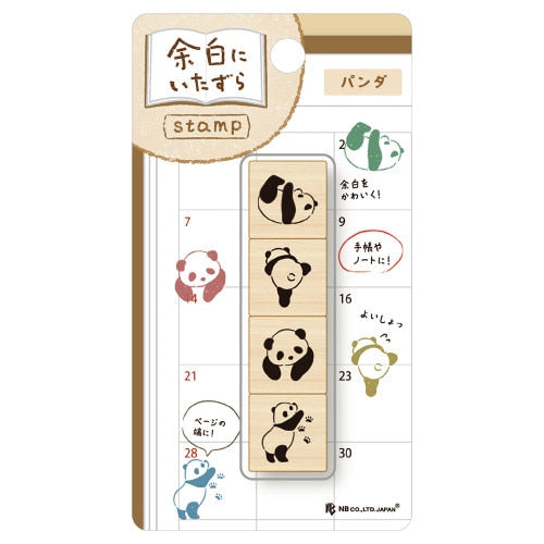 Close-up of NB panda wooden stamps showing hanging, peeking, and standing poses on notebook margin