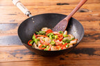 River Light Kiwame Premium nitrided iron Peking wok in use