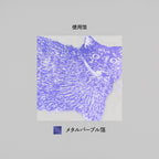 Close-up of metallic purple foil cat sticker texture