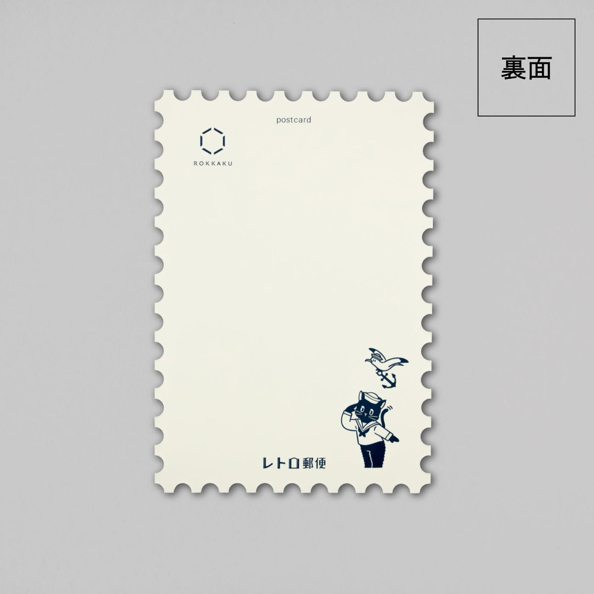 Back of cream-colored die-cut postcard with small sailor cat logo